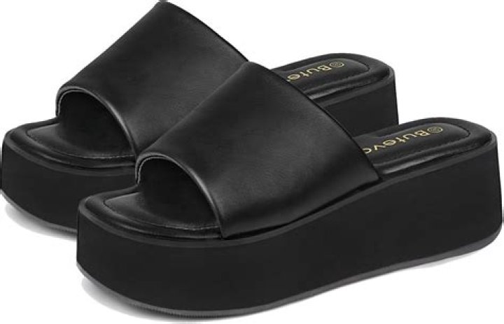 A ultra-cushioned black slide sandal
