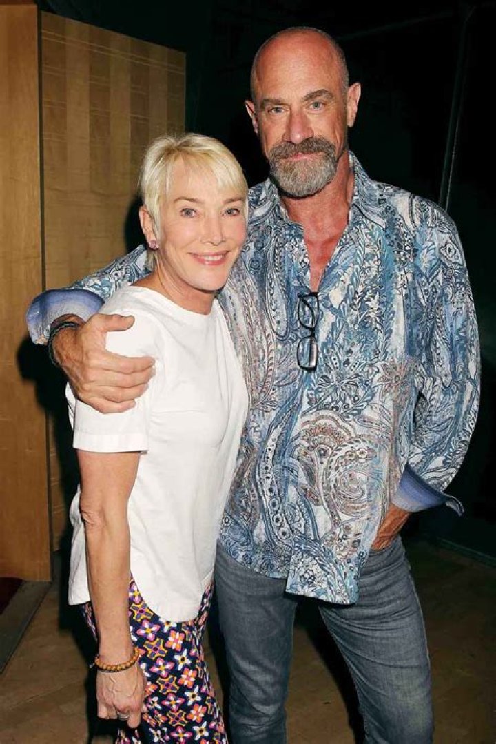 Actor Christopher Meloni, left, and his wife Sherman Williams, right, attend a special screening of "No Time to Die" hosted by Champagne Bollinger and The Cinema Society at iPic Theater, in New York NY Special Screening of "No Time to Die", New York, United States - 07 Oct 2021