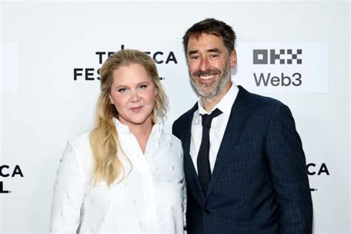 Amy Schumer with husband Chris Fischer and son Gene David Fischer having a fun day at the beach in Saint Barts, French West Indies on December 27, 2022. Photo by ABACAPRESS.COM**USE CHILD PIXELATED IMAGES IF YOUR TERRITORY REQUIRES IT**Pictured: Amy SchumerRef: SPL5511875 271222 NON-EXCLUSIVEPicture by: AbacaPress / SplashNews.comSplash News and PicturesUSA: +1 310-525-5808London: +44 (0)20 8126 1009Berlin: +49 175 3764 Arab Emirates Rights, Australia Rights, Bahrain Rights, Canada Rights, Greece Rights, India Rights, Israel Rights, South Korea Rights, New Zealand Rights, Qatar Rights, Saudi Arabia Rights, Singapore Rights, Thailand Rights, Taiwan Rights, United Kingdom Rights, United States of America Rights