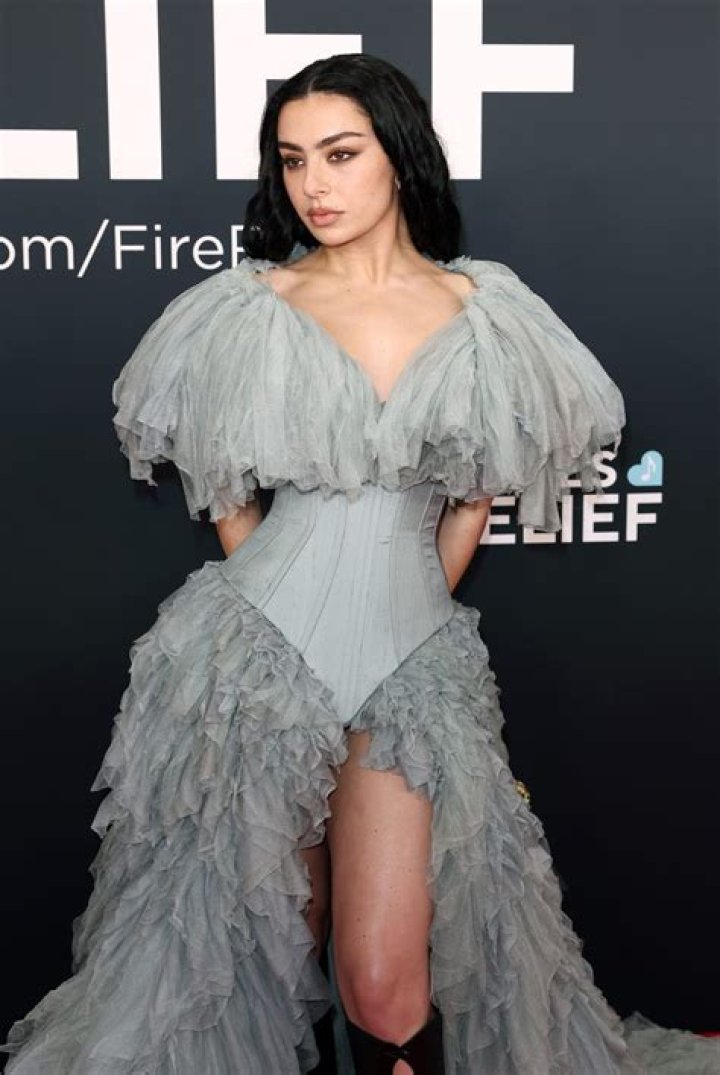 Charli XCX as Belle from Beauty and the Beast