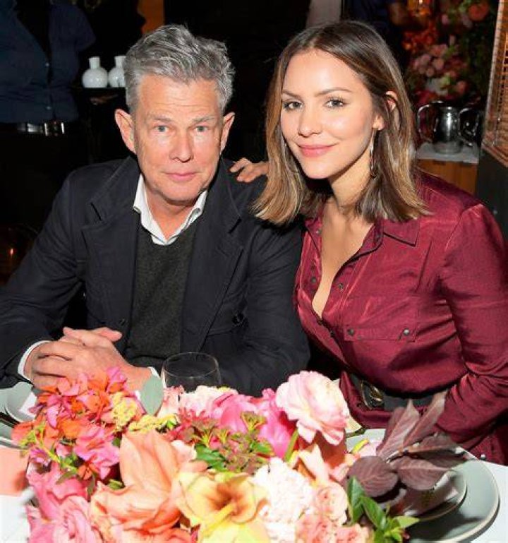 KAtherine McPhee and David Foster leave their wedding reception.
