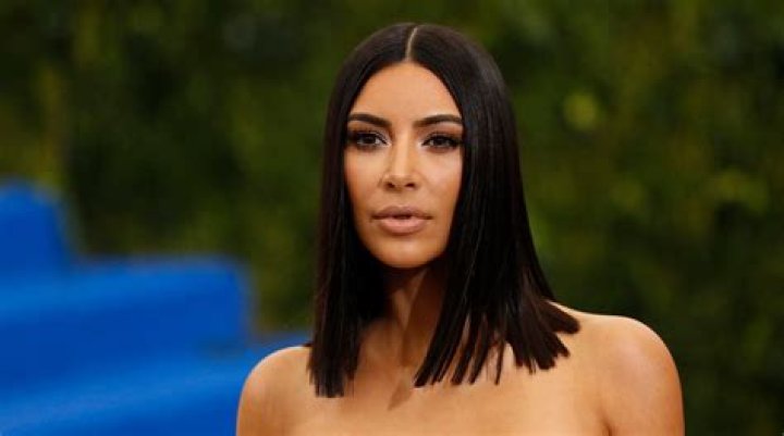 Kim Kardashian in a string criss-cross dress