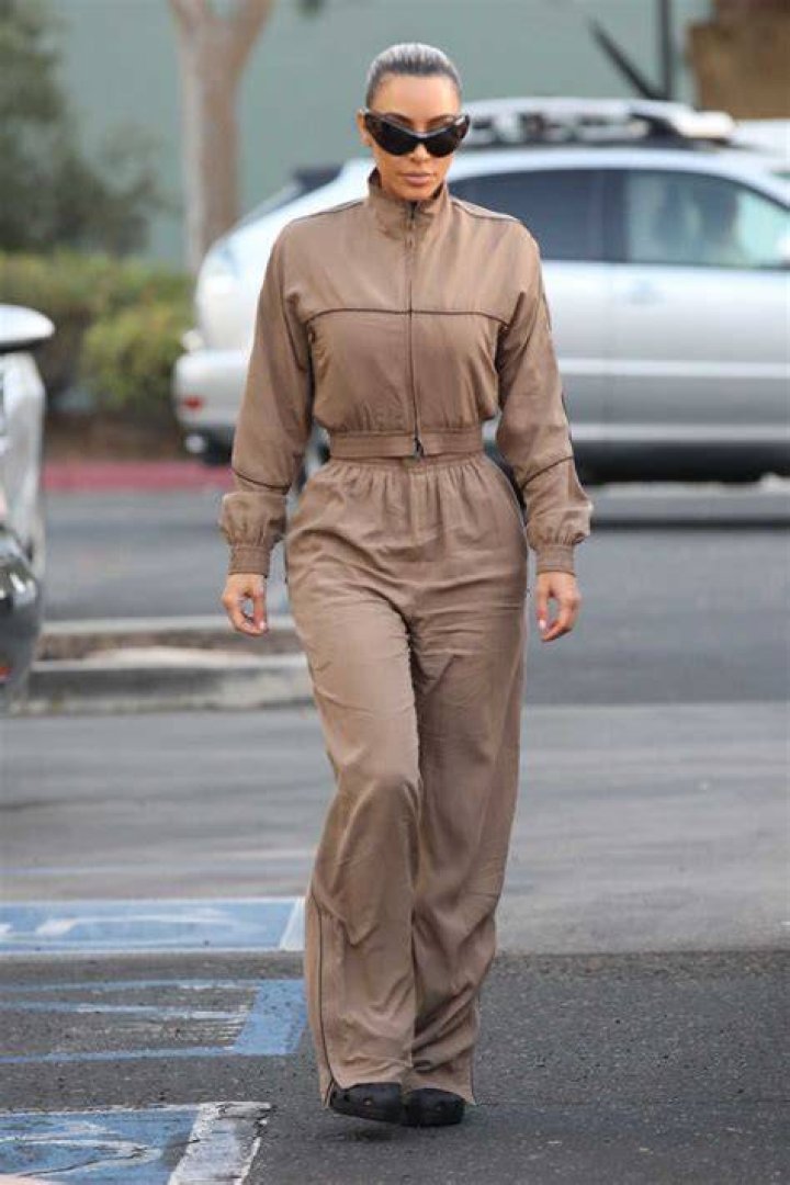 Kim Kardashian in a tan coat