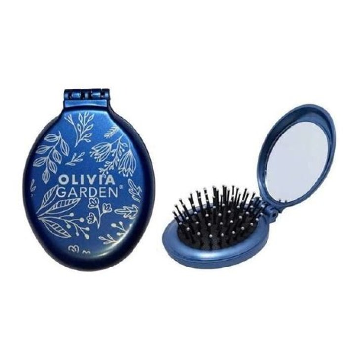 Olivia Garden Holiday Glitz Compact Styling Brush with Scalp-Hugging Shape, $3.99 each, oliviagarden.com