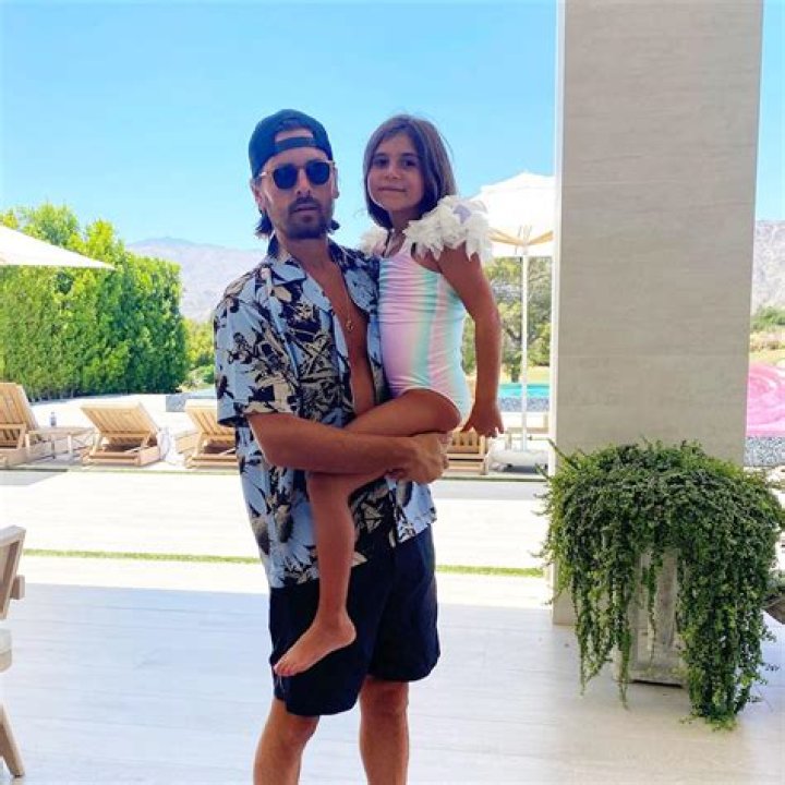 Scott & Penelope Disick Holding Hands