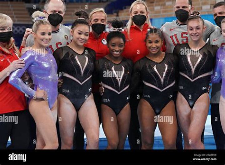 United States Artistic Gymnasts Simone Biles, center, poses for a group photo after their practice session at Ariake Gymnastics Centre before the start of the Tokyo Olympic Games in Tokyo, Japan, on Thursday July 22, 2021. Standing from left to right are: Mykayla Skinner, Sunisa Lee, Simone Biles, Jordan Chiles, Grace McCallum and Jade Carey. Tokyo Olympics, Japan - 22 Jul 2021